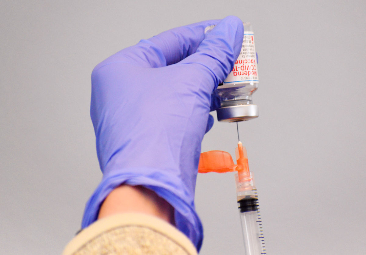 Dose of the Moderna vaccine being filled
